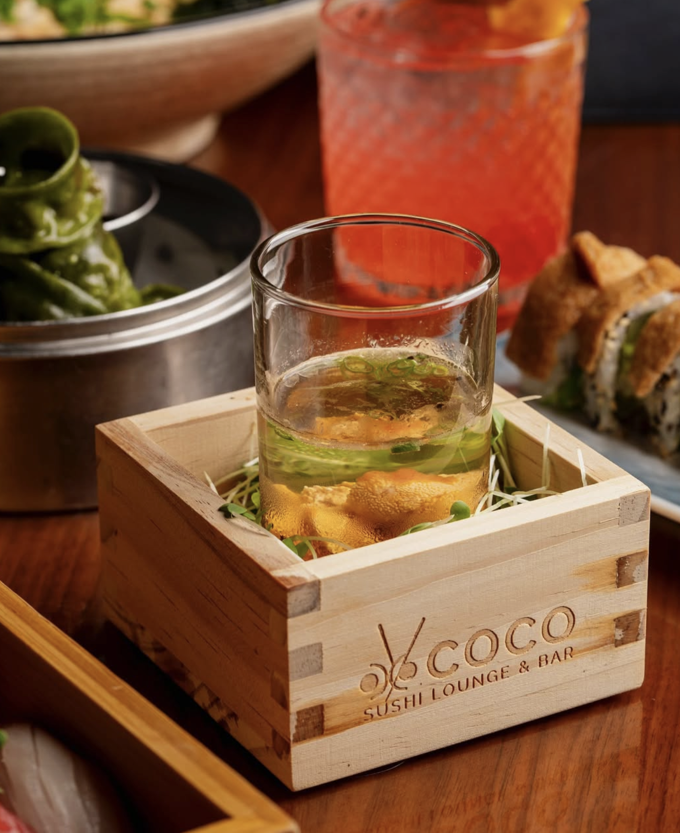 An oyster shot served in a shot glass